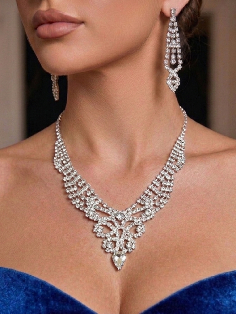 Costume jewelry set: necklace and 2 " drop earrings ADD some bling this summer.